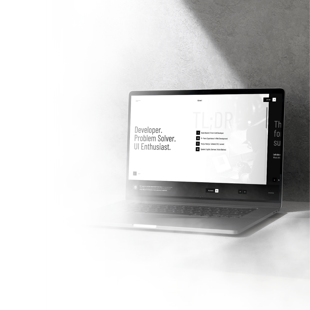 'a man sitting in a restaurant with laptop'